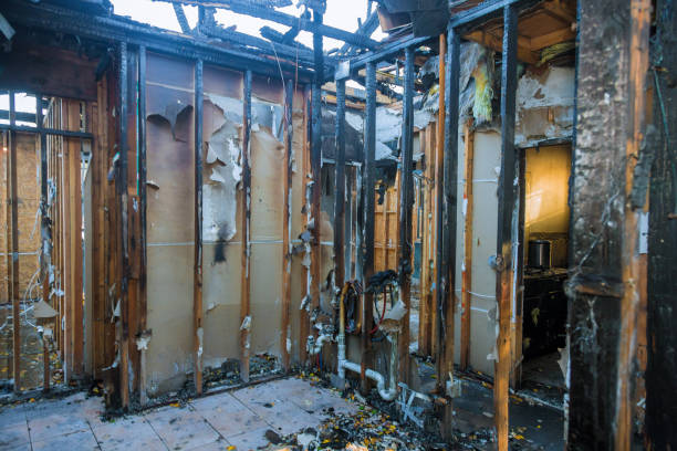 Professional Fire Damage Restoration technician working in Lake Isabella, MI